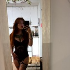 Profile picture of redheadxdoll